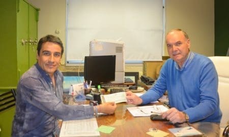Villa Cañás: El intendente Gizzi entregó el canon del Balneario a la Escuela Técnica 484